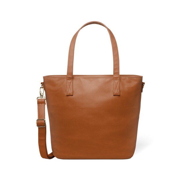 Brown leather tote bag with gold-toned metal hardware, front view on white background