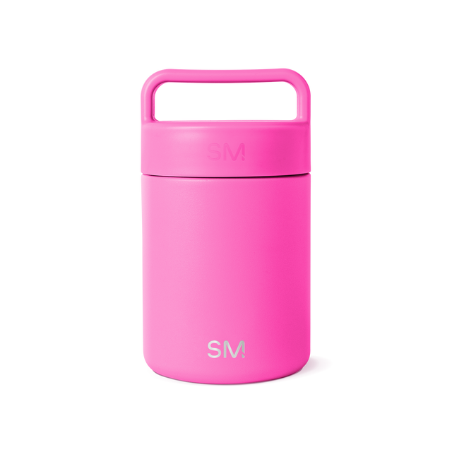 Hot pink ceramic jar with white background