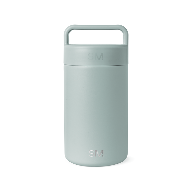 Sage green cylindrical insulated container with matte finish and integrated handle on white background