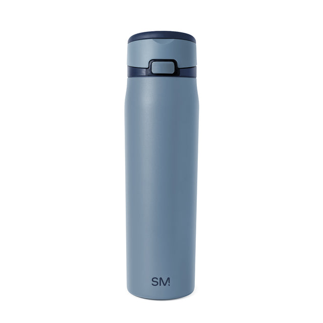 Slate blue insulated tumbler with dark navy blue lid and band accent, featuring a clean minimalist design