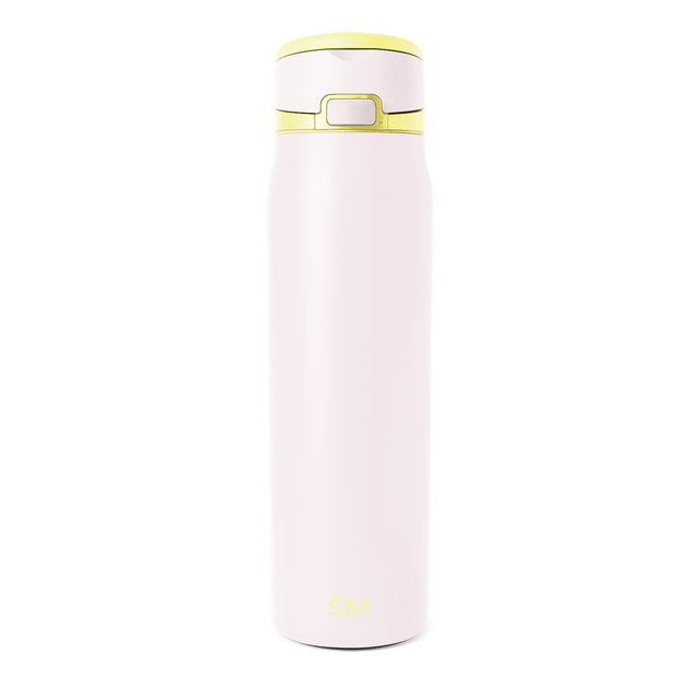 Pink insulated water bottle with yellow lid and center band featuring a push-button mechanism, set against white background. Simple Modern logo visible on bottle body.