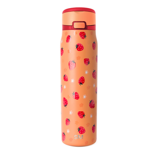 Peachy-coral cosmetic bottle with ruby red lid and rim, decorated with bright red strawberries and dark green leaves