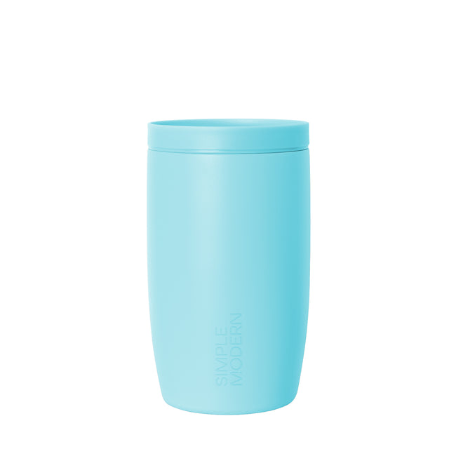 Soft pale aqua tumbler with clean white background