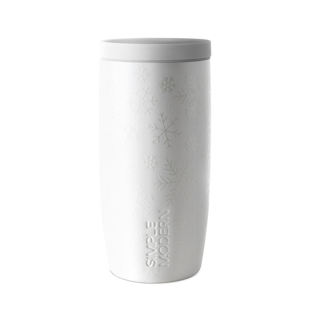 White insulated tumbler with embossed snowflake pattern and gray tones, displayed against a white background.