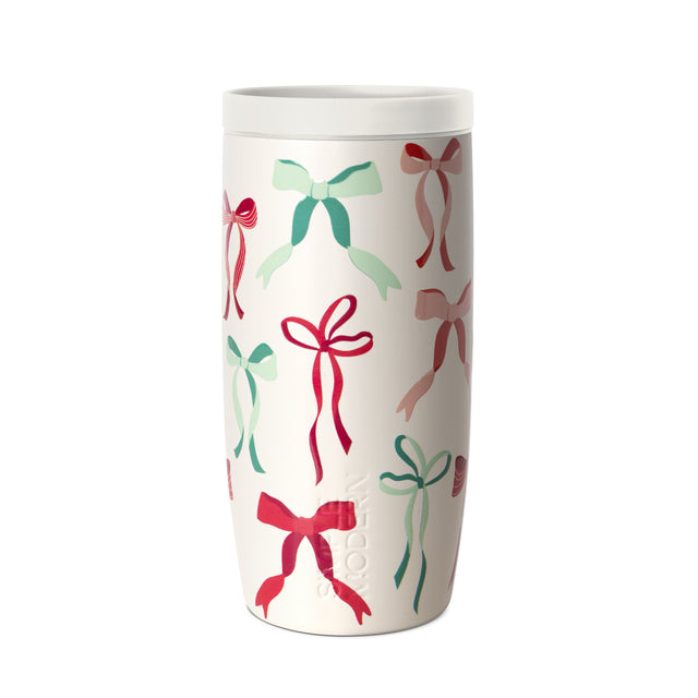 Cream tumbler with red, pink, and coral bow and ribbon design accents, paired with soft sage green and teal tones