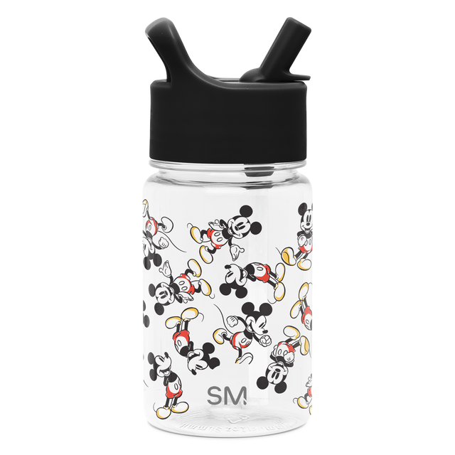 Transparent container with black lid and spout assembly, clear base showcasing contents, minimalist product design