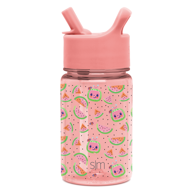 Soft pink mug with bright green, orange, yellow, and purple accents and a salmon pink handle