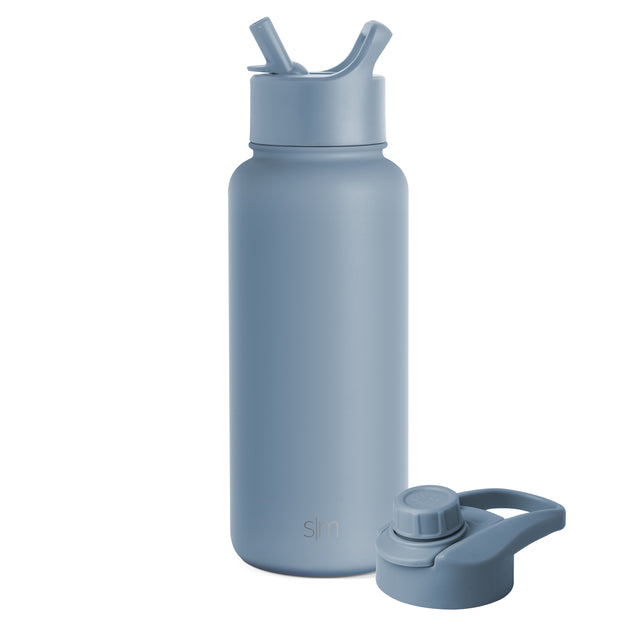 Slate blue water bottle with matching detachable lid on white background