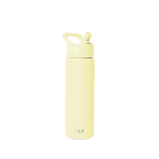 Soft pale yellow cylindrical bottle with matching cap and SM logo, displayed on a clean white background.