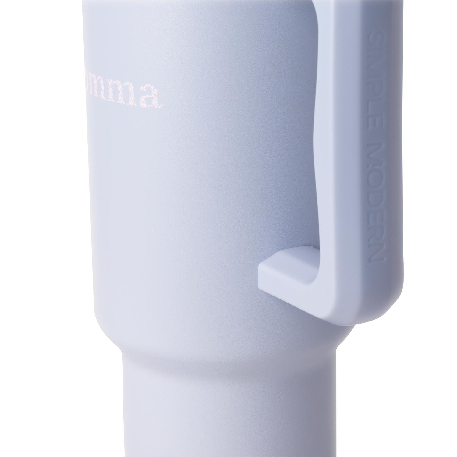 Close-up of a single green leaf against a white background.