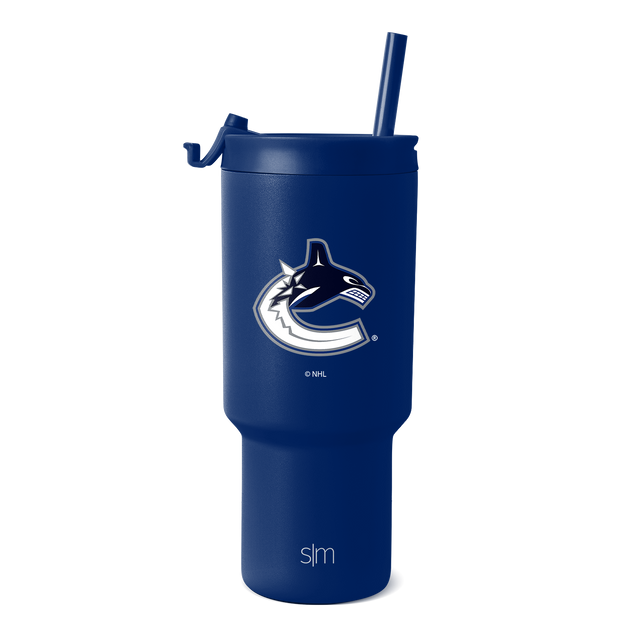 Navy blue insulated tumbler with white and silver metallic team logo and branding accents on cylindrical body and lid