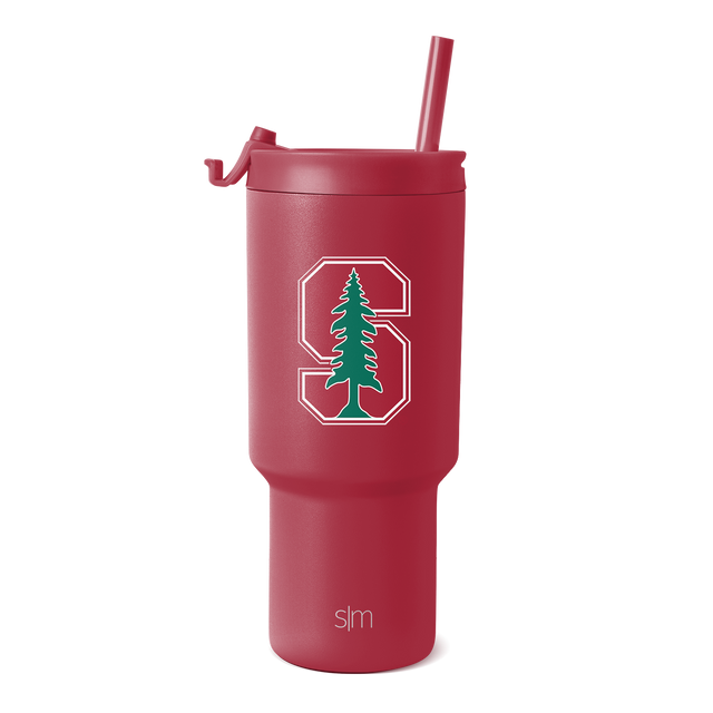 Burgundy wine-red tumbler with green and white decorative graphics on white background.