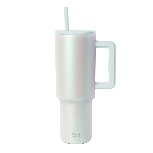 Tall insulated tumbler with handle and straw featuring gradient color finish transitioning from white and pale pink to deeper tones, displayed against white background.