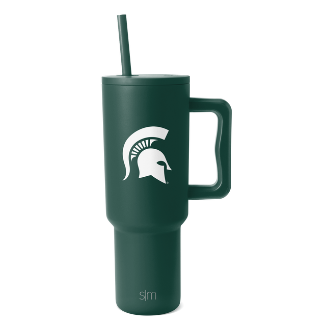 Deep forest green tumbler with matching straw and handle hardware, white logo and SM branding