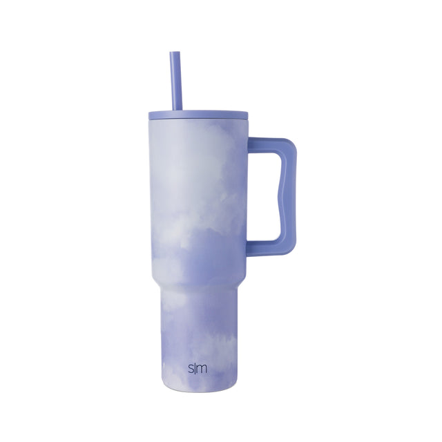 White and navy gradient watercolor tumbler with handle and lid, transitioning from pale lavender at top to deep slate blue at bottom