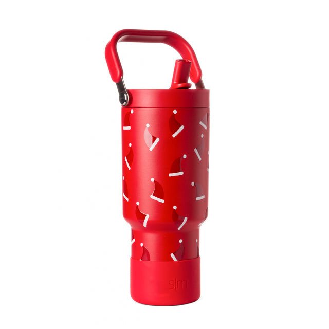 Red insulated tumbler with white and light gray geometric accent designs on the body