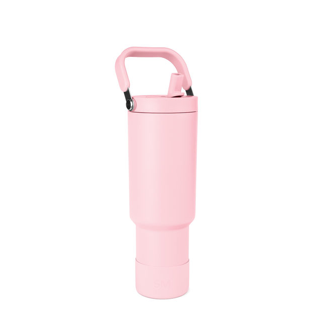 Tall cylindrical pale pink water bottle with rounded tapered design and wider middle section on white background