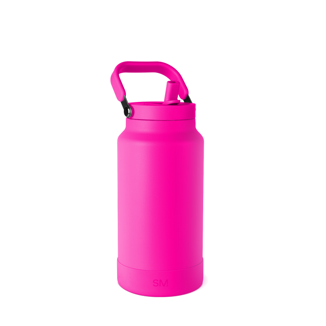 Hot pink water bottle against white background