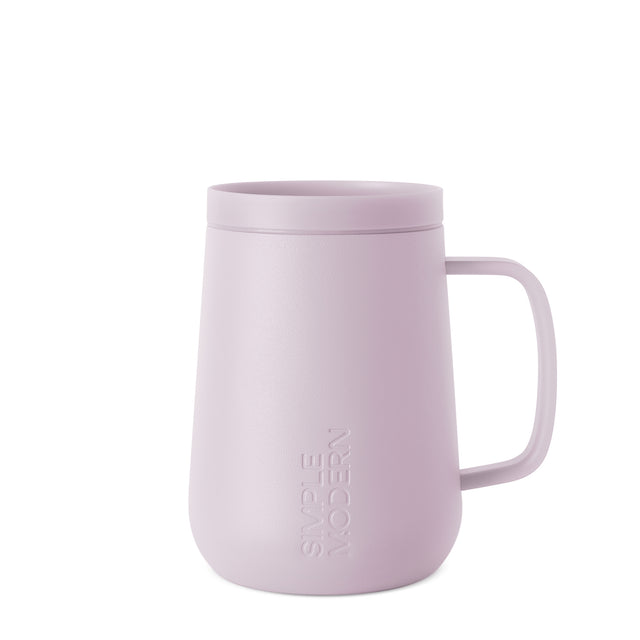 Pale mauve dusty pink mug with matching lid and handle on white background