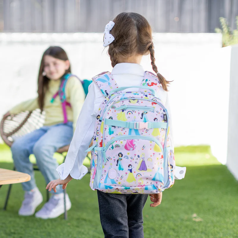Girl wearing disney backpack