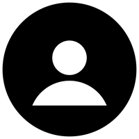 Black circle with white geometric shapes forming a symbol against dark background, representing the end human trafficking awareness icon.