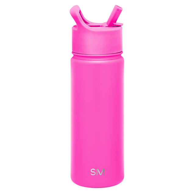 Vibrant hot pink cosmetic bottle on white background