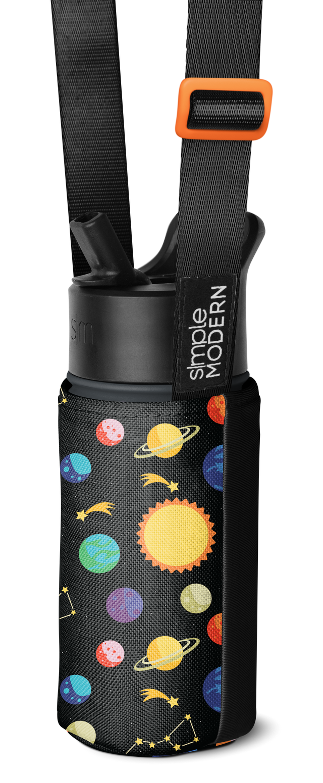 Black carrier bag with colorful straps featuring bright orange, yellow, blue, cyan, pink, and purple decorative elements