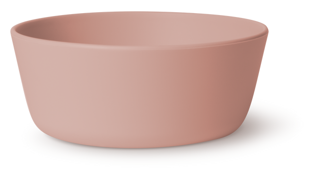Soft mauve ceramic bowl with dusty rose exterior and interior on clean white background