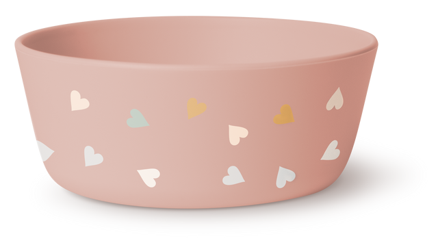 Dusty rose and cream colored product packaging with soft mint green and golden yellow accents