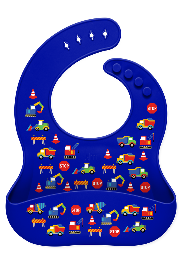 Colorful baby bib with royal blue base and repeated pattern in bright red, yellow, orange, green, and white