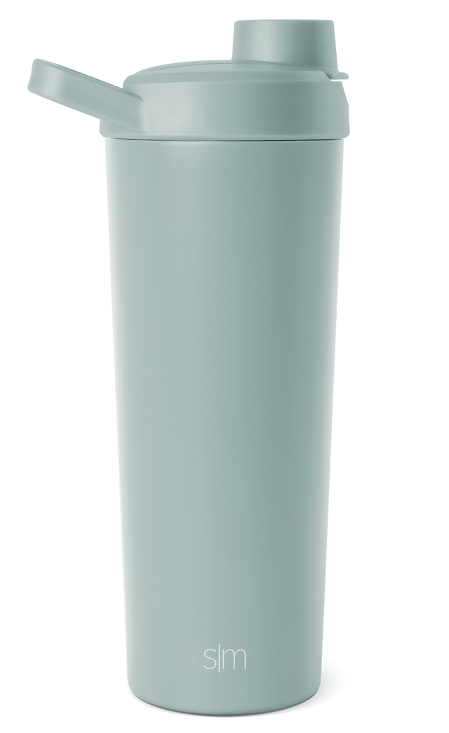 Soft sage green tumbler with muted celadon tone and subtle color variations, displayed against a neutral background