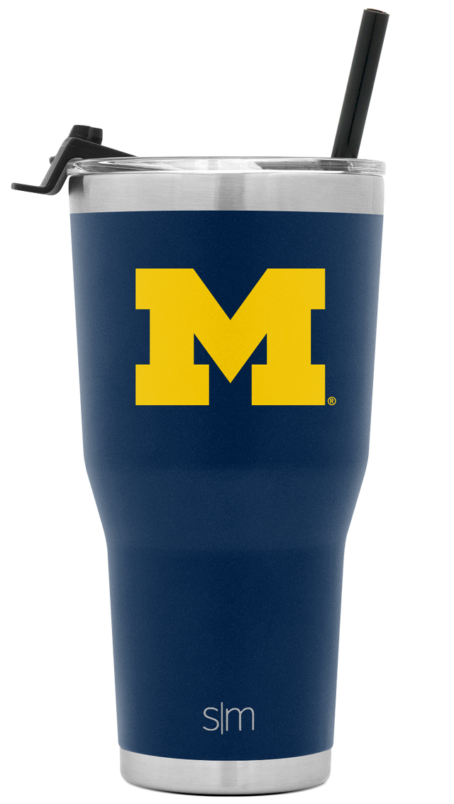 Navy blue stainless steel tumbler with brushed metal band and bright yellow University of Michigan 