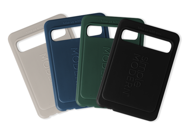 Four Simple Modern smartphone cases in coordinating colors arranged in a fan formation on white background, displaying soft greige, deep charcoal, sage green, and blush pink colorways.