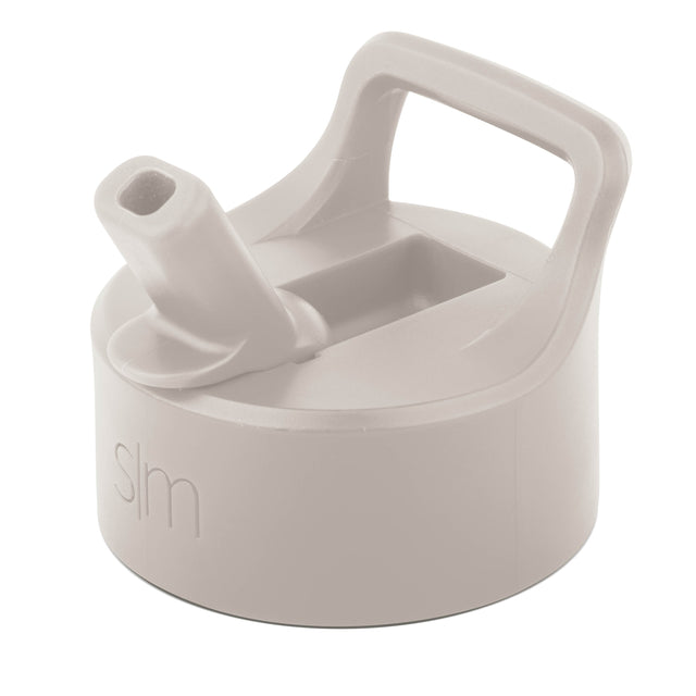 Small white straw lid with attached straw, displayed against a neutral cream background. Minimalist product shot showing simple design and matte finish.