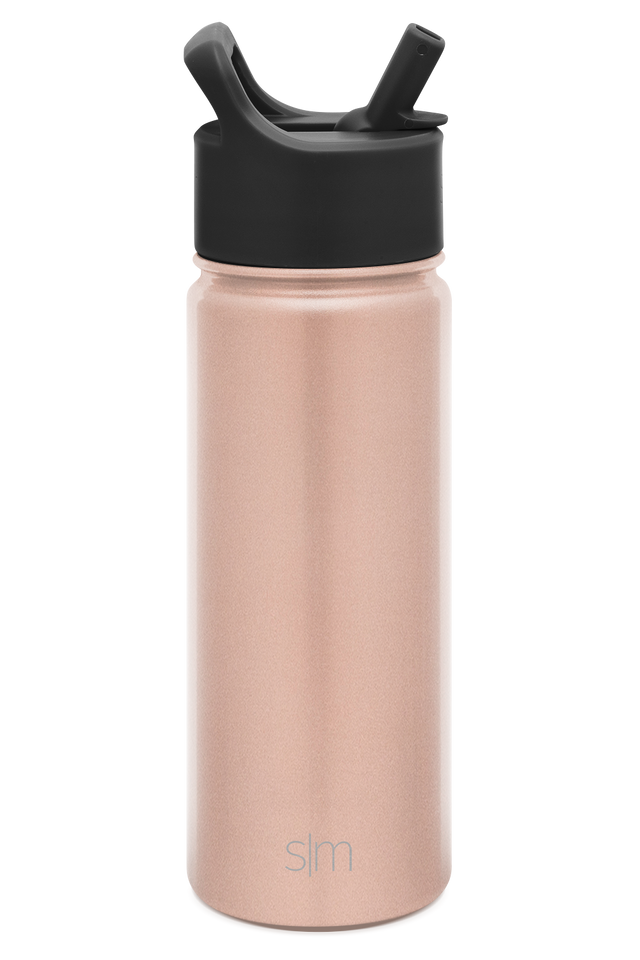 Soft dusty rose cylindrical bottle with matte black cap and lid assembly on white background